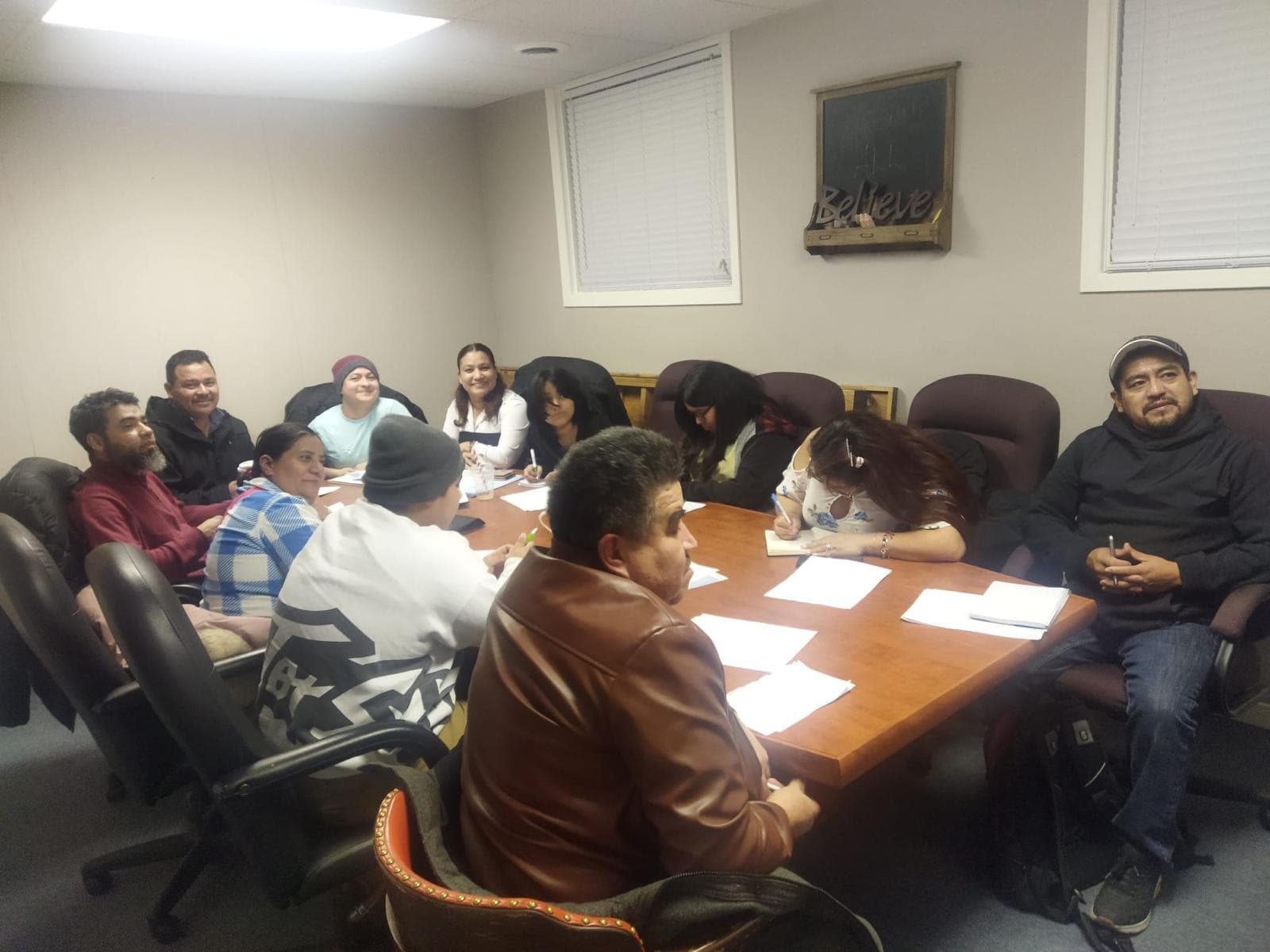 Street team members ready for community outreach with flyers